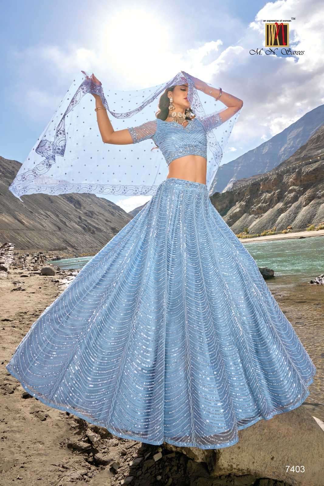 GIRLISH SERIES 7401 TO 7412 LEHENGA BY MN DESIGNER WITH HEAVY WORK LEHENGAS ARE AVAILABLE AT WHOLESALE PRICE