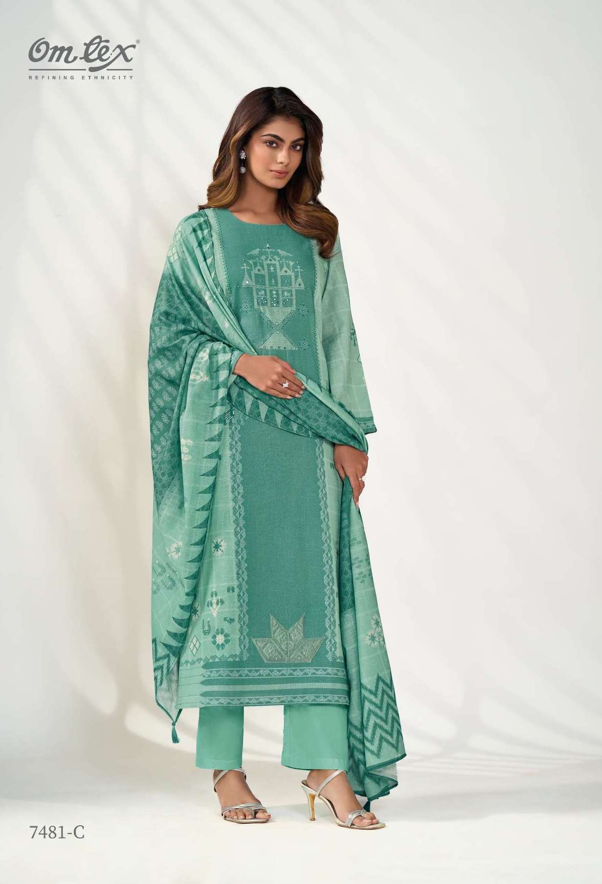 POSHAK SERIES 7481 BY OMTEX DESIGNER PRINTED WITH EMBROIDERY AND HAND WORK LINEN SUITS ARE AVAILABLE AT WHOLESALE PRICE