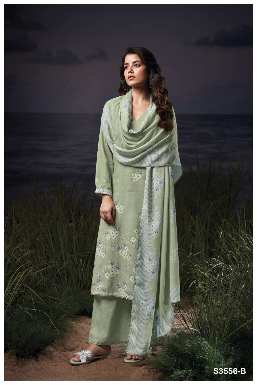 FAREN SERIES 3556 BY GANGA DESIGNER PRINTED WITH EMBROIDERY AND HAND WORK COTTON DOBBY SUITS ARE AVAILABLE AT WHOLESALE PRICE
