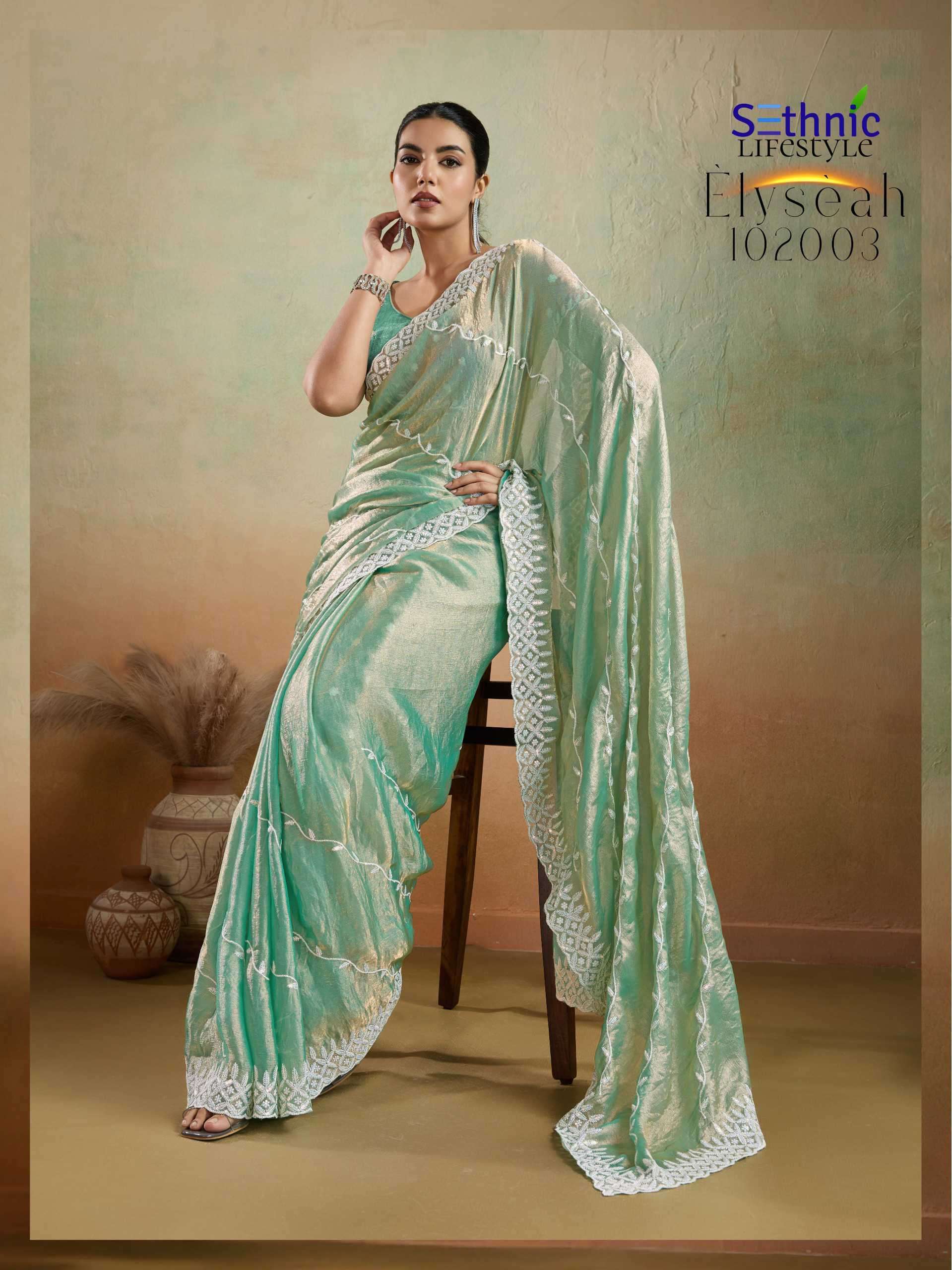 ELYSEAH SERIES 102001 TO 102004 SAREE BY SETHNIC DESIGNER CHIFFONE VELVET SAREES ARE AVAILABLE AT WHOLESALE PRICE