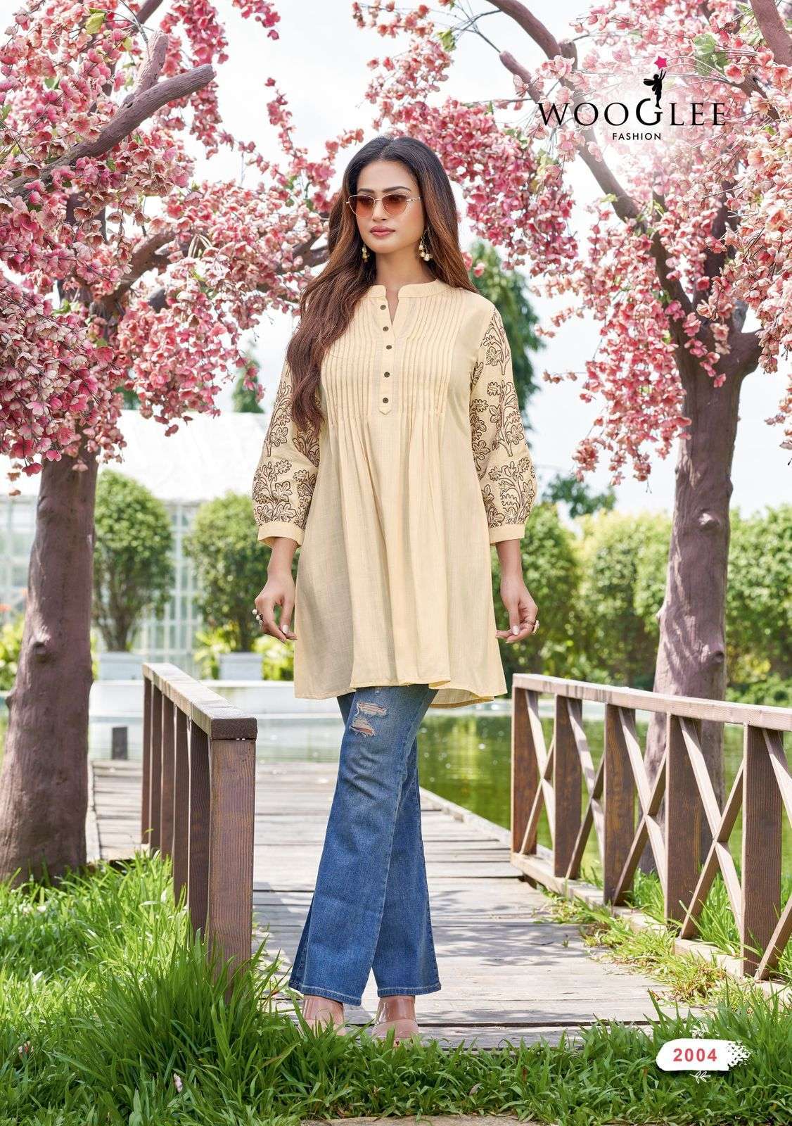 TRENDY TOURCH SERIES 2001 TO 2006 BY WOOGLEE DESIGNER THREAD AND HAND WORK RAYON SLUB KURTIS ARE AVAILABLE AT WHOLESALE PRICE