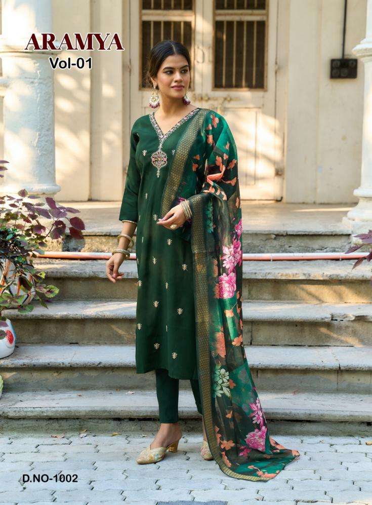 ARAMYA VOL-1 SERIES 1001 TO 1006 BY PASSION TREE DESIGNER EMBROIDERY WORK ROMAN SILK TOP WITH BOTTOM AND DUPATTA ARE AVAILABLE AT WHOLESALE PRICE