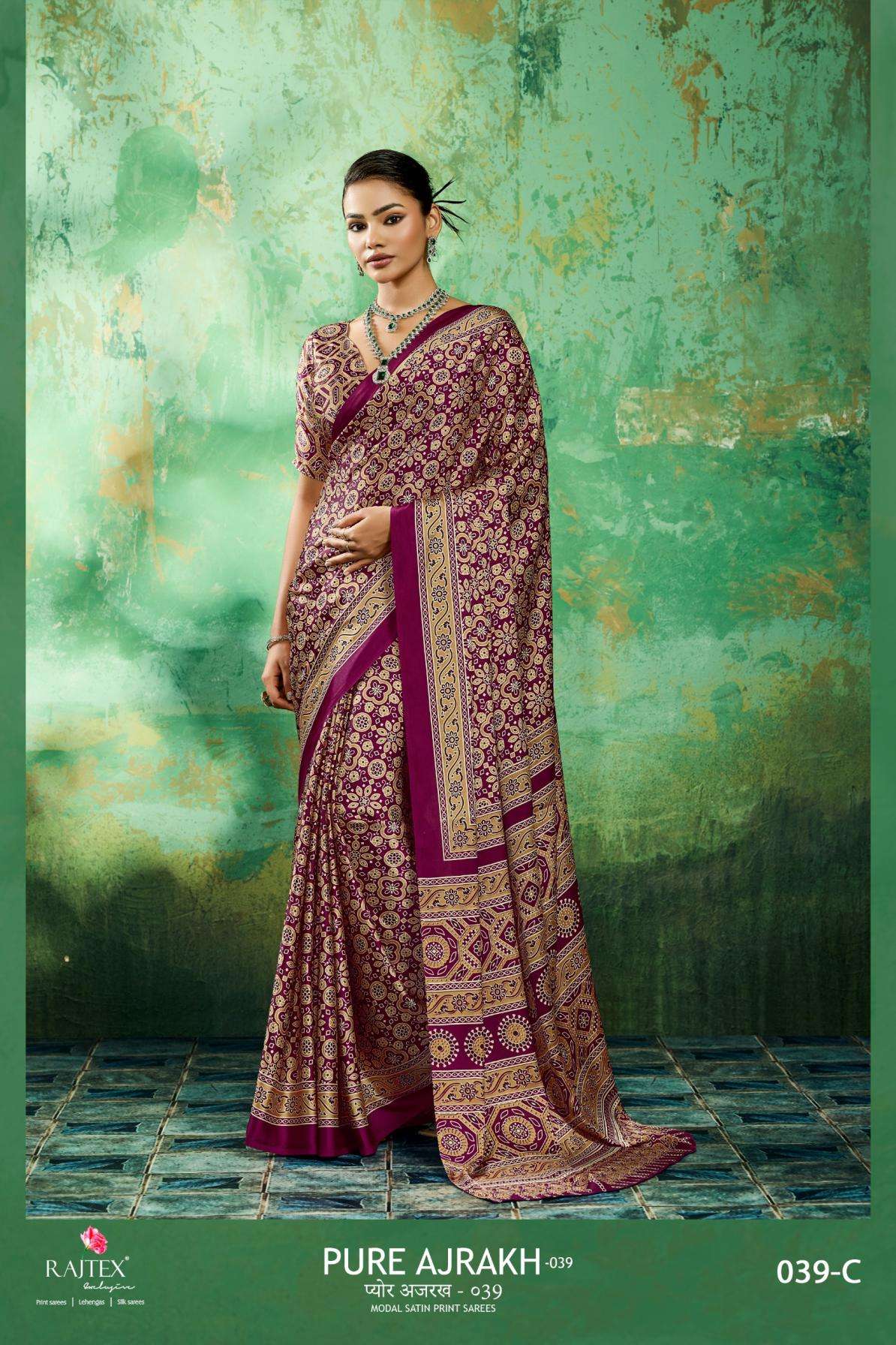 PURE AJRAKH VOL-39 SERIES 039A TO 094F SAREE BY RAJTEX DESIGNER AJRAKH PRINT MODAL SATIN SAREES ARE AVAILABLE AT WHOLESALE PRICE