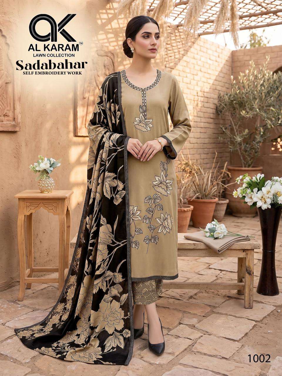 SADABAHAR SERIES 1001 TO 1005 BY GULL AAHMED DESIGNER EMBROIDERY WORK RAYON SUITS ARE AVAILABLE AT WHOLESALE PRICE
