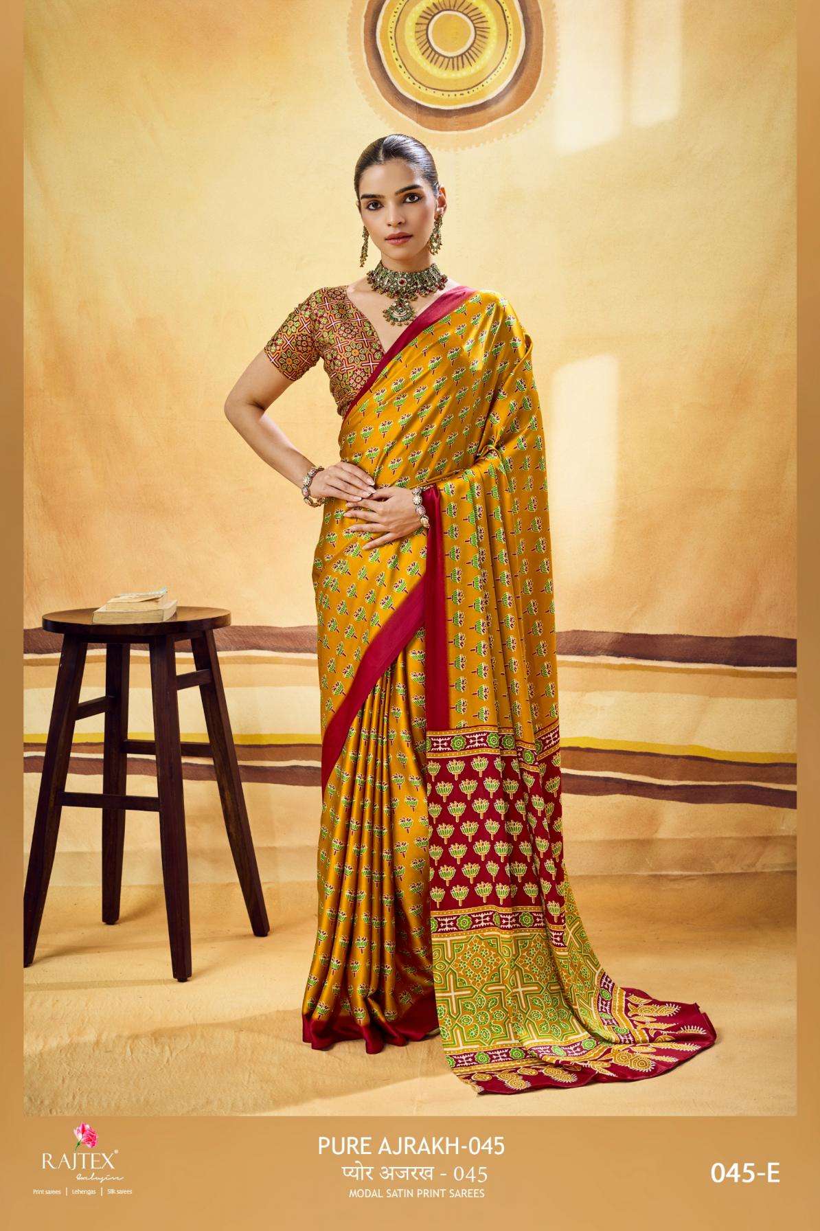 PURE AJRAKH VOL-45 SERIES 045A TO 045F SAREE BY RAJTEX DESIGNER AJRAKH PRINT MODAL SATIN SAREES ARE AVAILABLE AT WHOLESALE PRICE