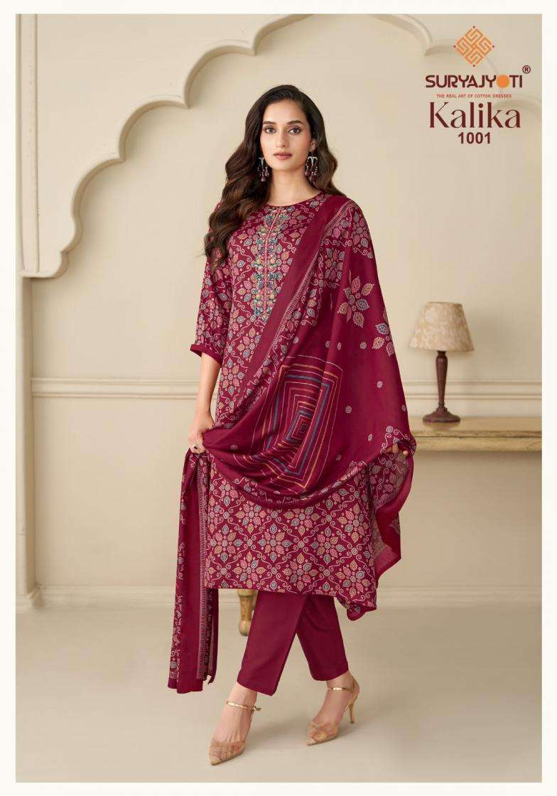 KALIKA VOL-1 SERIES 1001 TO 1006 BY SURYAJYOTI DESIGNER DISCHARGE FOIL PRINT AND EMBROIDERY HAND WORK JAM SATIN SUITS ARE AVAILABLE AT WHOLESALE PRICE