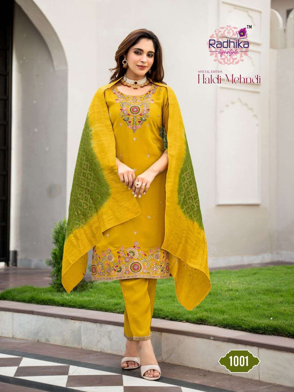 HALDI MEHNDI SERIES 1001 TO 1004 BY RADHIKA LIFESTYLE DESIGNER EMBROIDERY WORK CHIFFON TOP WITH BOTTOM AND DUPATTA ARE AVAILABLE AT WHOLESALE PRICE