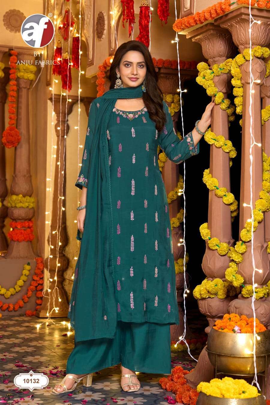 SAKHI SERIES 10131 TO 10134 BY ANJU FABRICS DESIGNER HAND WORK MUL CHANDERI TOP WITH BOTTOM AND DUPATTA ARE AVAILABLE AT WHOLESALE PRICE
